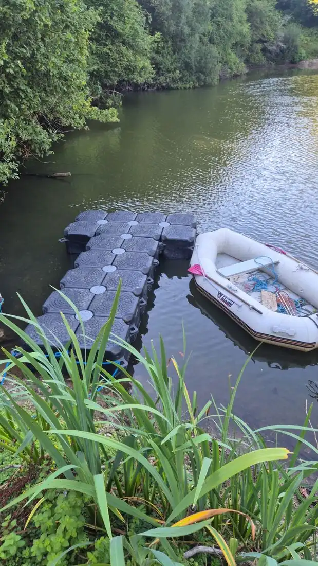 Floating work platform on Ennal's Pool